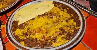 El Rancho Grande Mexican Food signature dishes Night HawkWhite QuesoTwo Chicken Enchiladas